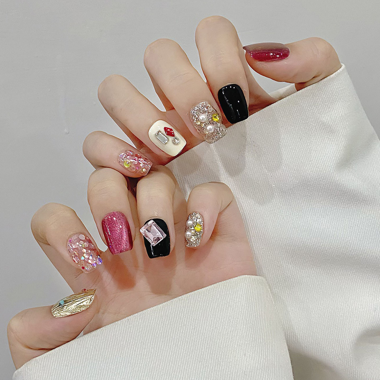 เล็บปลอมสีชมพูแวววาวแบบทำด้วยม - Nail Art Eye Cat บทวิจารณ์และราคา